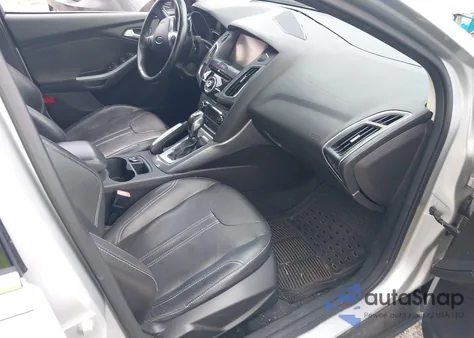 2012 Ford Focus Titanium z USA, uszkodzony, nr VIN 1FAHP3J28CL381248